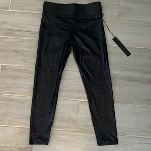 Brand new shiny leggings size small